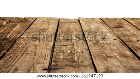 Old vintage planked wood table in perspective on white background
