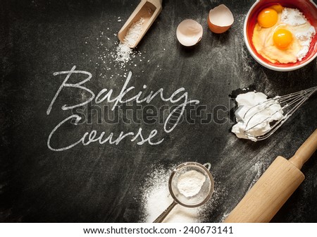 Baking course poster design with cake ingredients on black chalkboard from above. Bowl, flour, eggs, egg whites foam, eggbeater, rolling pin and eggshells.