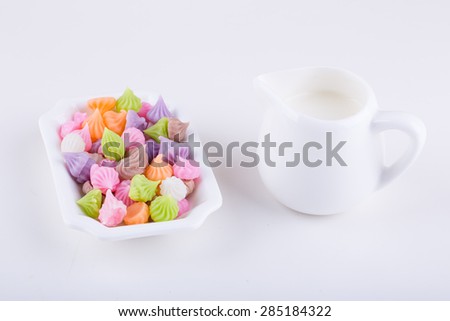 Aalaw candy, Thai candy dessert with a jar of milk on white background
