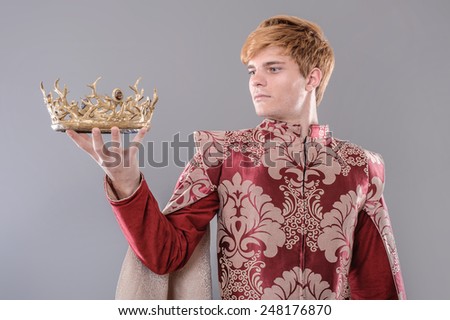 Medieval King. Medieval king with sword and crown.