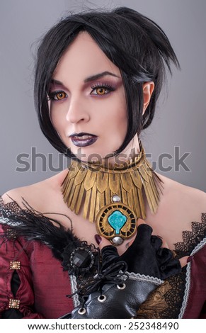 Dark gothic woman. Sexy gothic woman posing in studio.