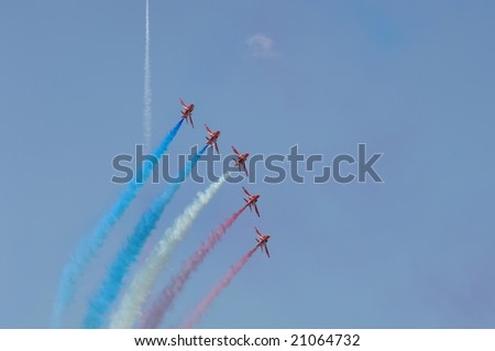 FAIRFORD, UK - JULY 17: Royal Air Force Red Arrows Demonstration squadron perform an aerial display at the Royal International Air Tattoo on July 17, 2005 in Fairford, UK.