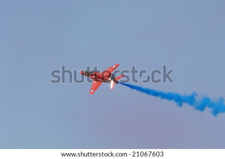 FAIRFORD, UK - JULY 17: RAF Red Arrows solo plane performing during a demonstration at Royal International Air Tattoo on July 17, 2005 in Fairford, UK.