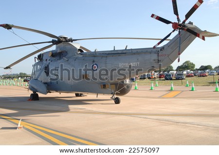 FAIRFORD, UK - JULY 16: Royal Navy  HC4 Sea King helicopter with Tiger Meet Paint scheme on static desplay at the Royal International Air Tattoo on July 16, 2005 in Fairford, UK.
