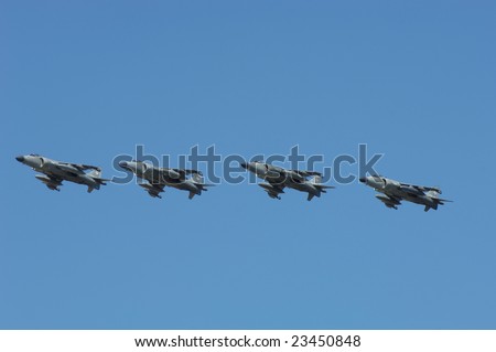 FAIRFORD, UK - JULY 16: Royal Navy FA2 Sea Harrier Jump jet 4 ship flypast during an air demonstration at the Royal International Air Tattoo on July 16, 2005 in Fairford, UK.