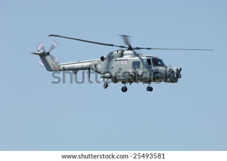 FAIRFORD, UK - JULY 16, 2005: Royal Navy HAS3 Lynx helicopterperforms a flypast during an air demonstration at the Royal International Air Tattoo on July 16, 2005 in Fairford, UK.