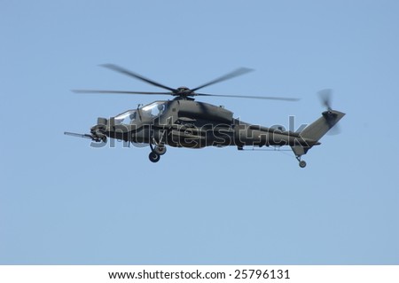FAIRFORD, UK - JULY 16, 2005: Italian Army A129 Mongusta attack helicopter hovers during an air demonstration at the Royal International Air Tattoo on July 16, 2005 in Fairford, UK.