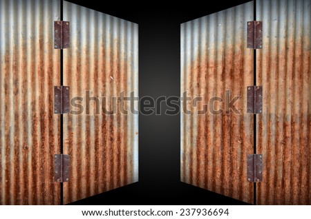 open old zinc door,rusty corrugated iron metal on black background