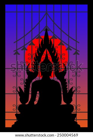 Silhouette of buddha and wrought iron window on the sunset
