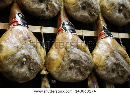 MILAN, ITALY - MAY 22: Italian raw hams san daniele hanged in Tuttofood, Milano World Food Exhibition on May 22, 2013 in Milan, Italy