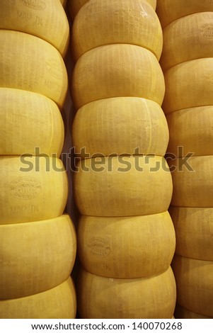 MILAN, ITALY - MAY 22: close-up of wheels of parmigiano reggiano, Tuttofood, Milano World Food Exhibition on May 22, 2013 in Milan, Italy