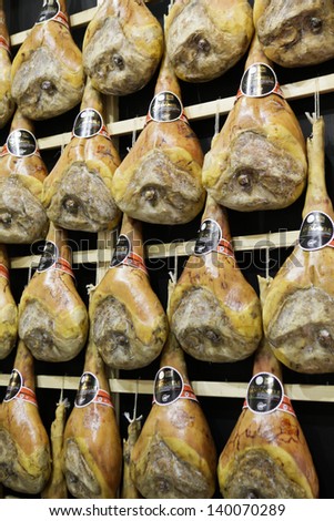 MILAN, ITALY - MAY 22: San Daniele raw hams hanged in Tuttofood, Milano World Food Exhibition on May 22, 2013 in Milan, Italy