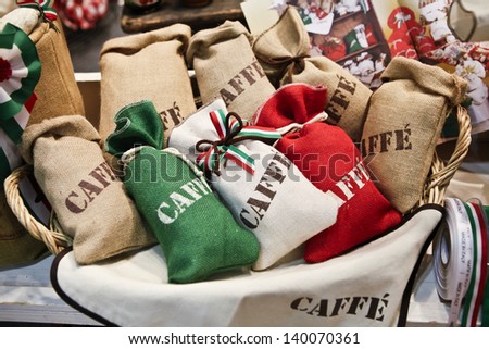 MILAN, ITALY - MAY 22: Bags of coffee with Italian flag\'s colors, green, white and red, Tuttofood, Milano World Food Exhibition on May 22, 2013 in Milan, Italy