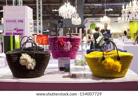 MILAN, ITALY - SEPEMBER 12: Colored bags in a booth at Macef, International Home Show Exhibition on September 12, 2013 in Milan, Italy