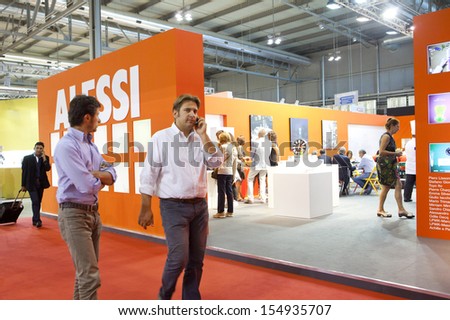 MILAN, ITALY - SEPT 12: Booths and people walking in Macef, International Home Show Exhibition on September 12, 2013 in Milan, Italy