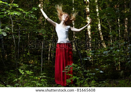 Portrait of romantic woman in fairy forest