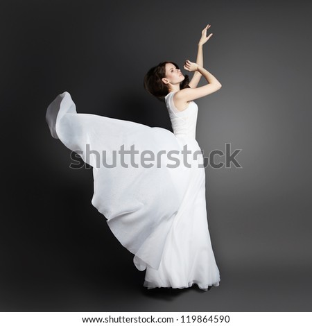 Romantic beautiful woman wearing white dress