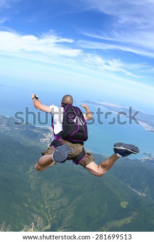 skydiver in free fall in a beautiful island in Brazil