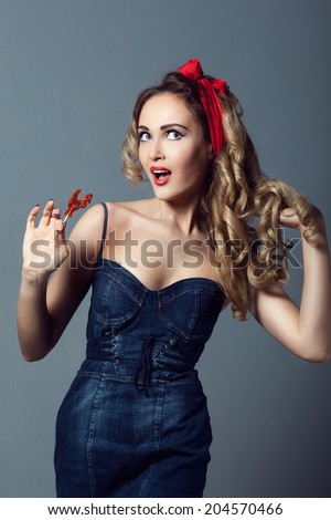 portrait sexy blonde woman in jeans sundress and red shoes pin up girl retro woman  holding a lollipop red cockerel