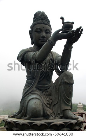 Buddhist Statue praising the big Buddha (Tian Tan Buddha) on Lantau (Hong Kong).
