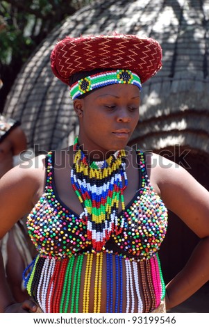 LESEDI CULTURAL VILLAGE, SOUTH AFRICA - JAN 1: Zulu woman wearing handmade clothing on January 1, 2008 at the Lesedi Cultural Village in South Africa. Beads are a pride of  the Zulu nation.