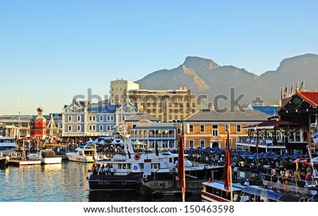 CAPE TOWN,SOUTH AFRICA-DECEMBER, 29:Victoria and Alfred Waterfront, harbor with recreation boats, shops, restaurants and Table Mountain on background at December 29, 2007  in Cape Town, South Africa.
