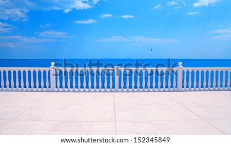 Summer View With Classic White Balustrade And Empty Terrace Overlooking The Sea (Italy)