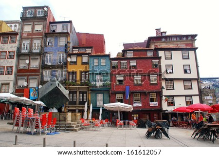 PORTO, PORTUGAL - MAY 06: Multicolored houses on Ribeira square at May 06, 2009 in Porto, Portugal. The historic centre of Porto was declared a World Heritage Site. by UNESCO