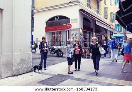 Nice, France - May 14:Tourists And Local People Walking On The Charming Vintage Streets Of Old Town In Nice, France On May 14, 2013.