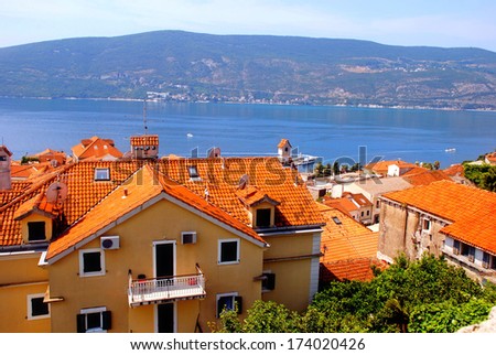 Herceg Novi, Montenegro. Red Roofs, Blue Sea, Green Plants - Ideal Summer Landscape. Herceg Novi Is A Coastal Town In Montenegro, Located At The Entrance To The Bay Of Kotor