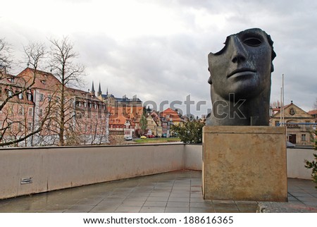 BAMBERG, GERMANY - JANUARY 03, 2012: Cityscape with old houses and modern sculpture , Bamberg, Germany