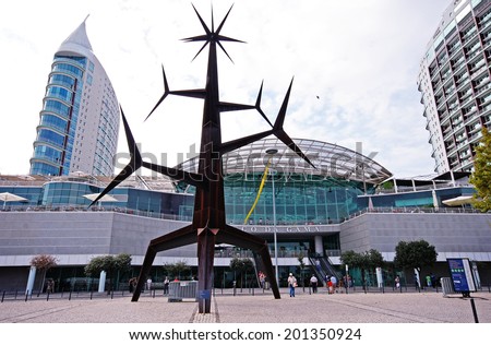 LISBON, PORTUGAL - SEPTEMBER 28, 2009: Modern  Sculpture and Vasco da Gama Shopping Centre in Parque das Nacoes (Park of Nations), Lisbon, Portugal. One of the largest shopping malls in Lisbon