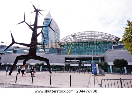 LISBON, PORTUGAL - SEPTEMBER 28, 2009: Modern  Sculpture and Vasco da Gama Shopping Centre in Parque das Nacoes (Park of Nations), Lisbon, Portugal. One of the largest shopping malls in Lisbon
