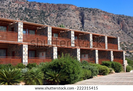ELOUNDA, GREECE - JULY 19, 2012: Summer landscape with modern summer resort holiday villa at Elounda, Crete, Greece.