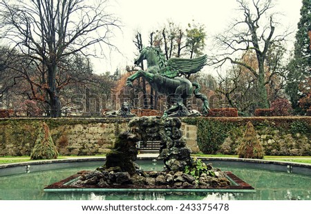 The famous fountain with Pegasus sculpture in Mirabell Gardens in Salzburg, Austria. Toned image