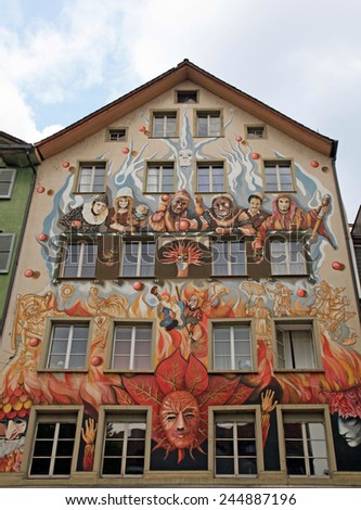 LUCERNE, SWITZERLAND - MAY 6, 2013: Fairy mural painting on the wall of a medieval house in Lucerne, Switzerland