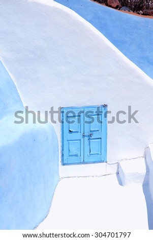 Detail of the typical blue and white house in Oia, Santorini island, Greece.