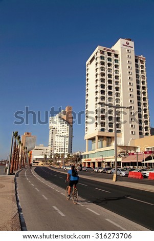 TEL AVIV, ISRAEL - SEPTEMBER 1, 2015: View of Tel Aviv beach promenade with modern hotels and buildings in Tel Aviv, Israel