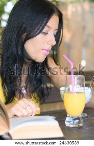 Lovely student girl in cafe
