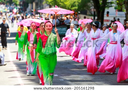 Portland, Oregon, USA - JUNE 7, 2014: Northwest Chinese Alliance in Grand floral parade through Portland downtown.
