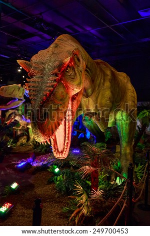Portland, Oregon, United States - AUGUST 2, 2014: A lively Allosaurus is on exhibition as part of \