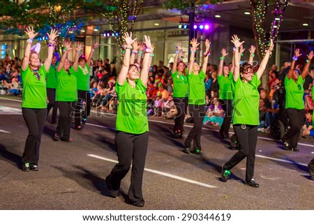 Portland, Oregon, USA - May 30, 2015: One More Time Around Again Marching Band in the Starlight Parade during Portland Rose Festival 2015.