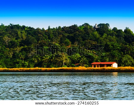 Horizontal vivid right aligned indian house on river landscape background backdrop