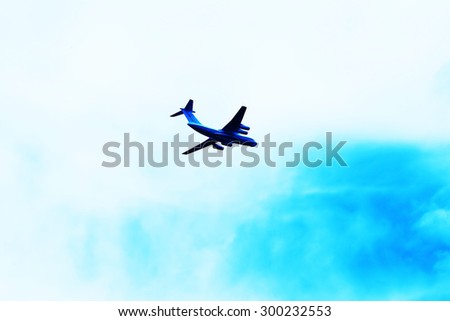 Horizontal vibrant jet plane with blue sky background