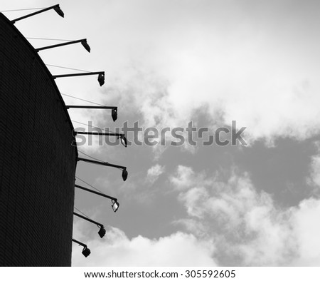 Horizontal black and white left aligned industrial lights background
