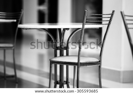 Horizontal black and white business chairs bokeh background