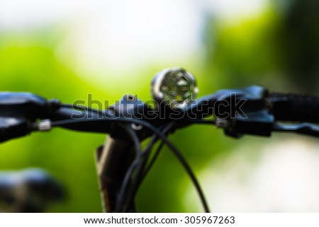 Horizontal vivid blurred bicycle headlight bokeh background