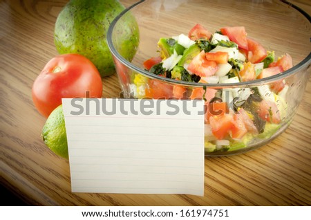 Ingredients in a bowl  with a blank white recipe card