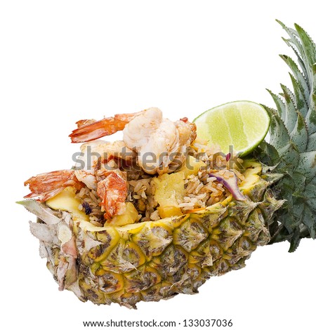 Baked rice with pineapple served in a pineapple