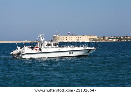 Sevastopol, Russian Federation-27 of July, 2014:  the boat floats by sea, honor of a holiday of navy of Russia
